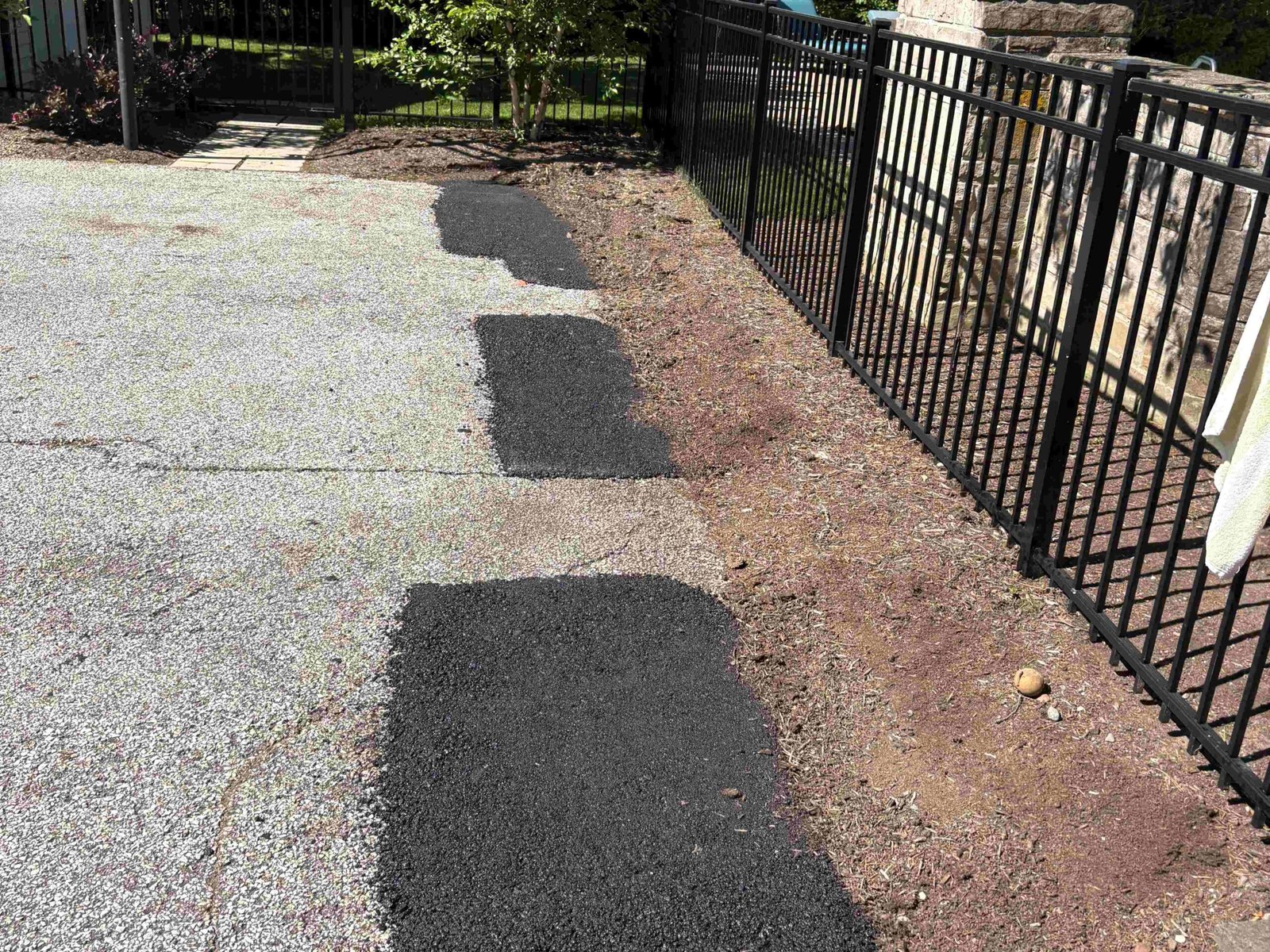 Paving equipment staged for a parking lot job