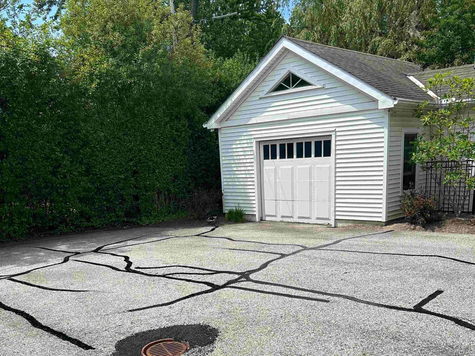 Freshly sealed smooth dark asphalt street