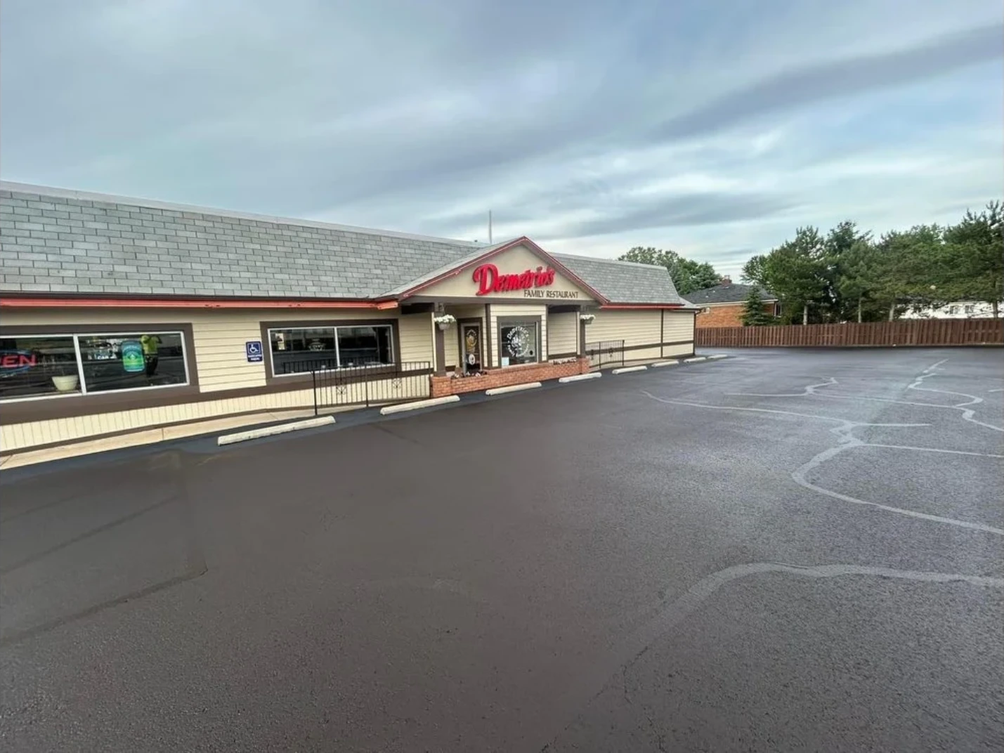 Aerial view of a commercial parking lot seal coating project
